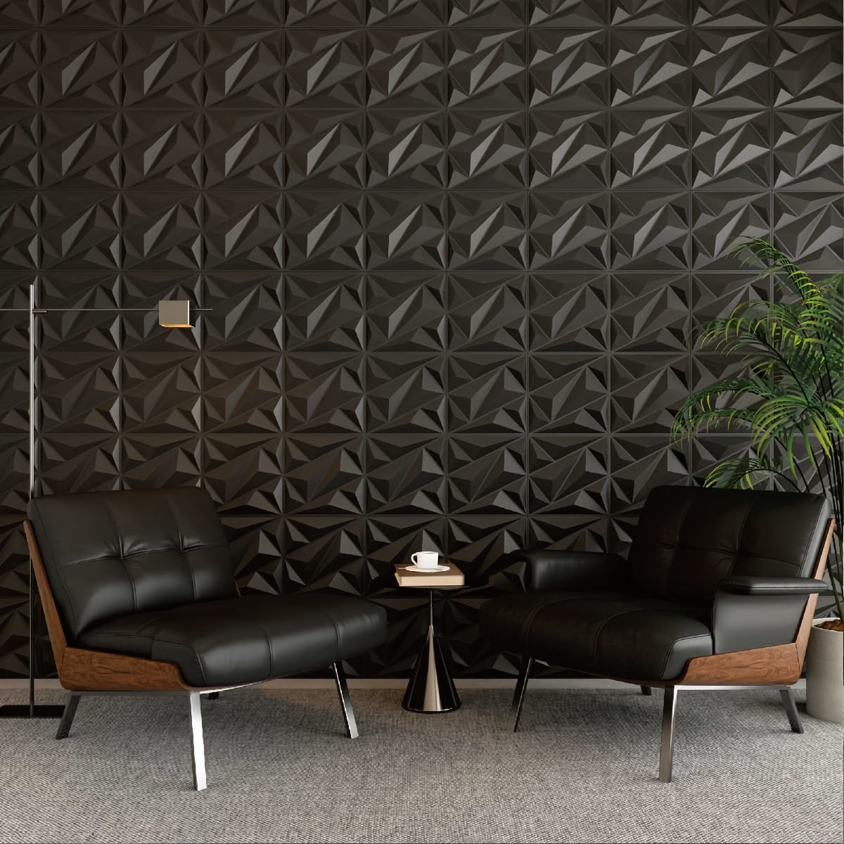 HighPeak PrismWall™ 3D Diamond Wall Panels in matte black texture behind modern black leather chairs and small table in living room