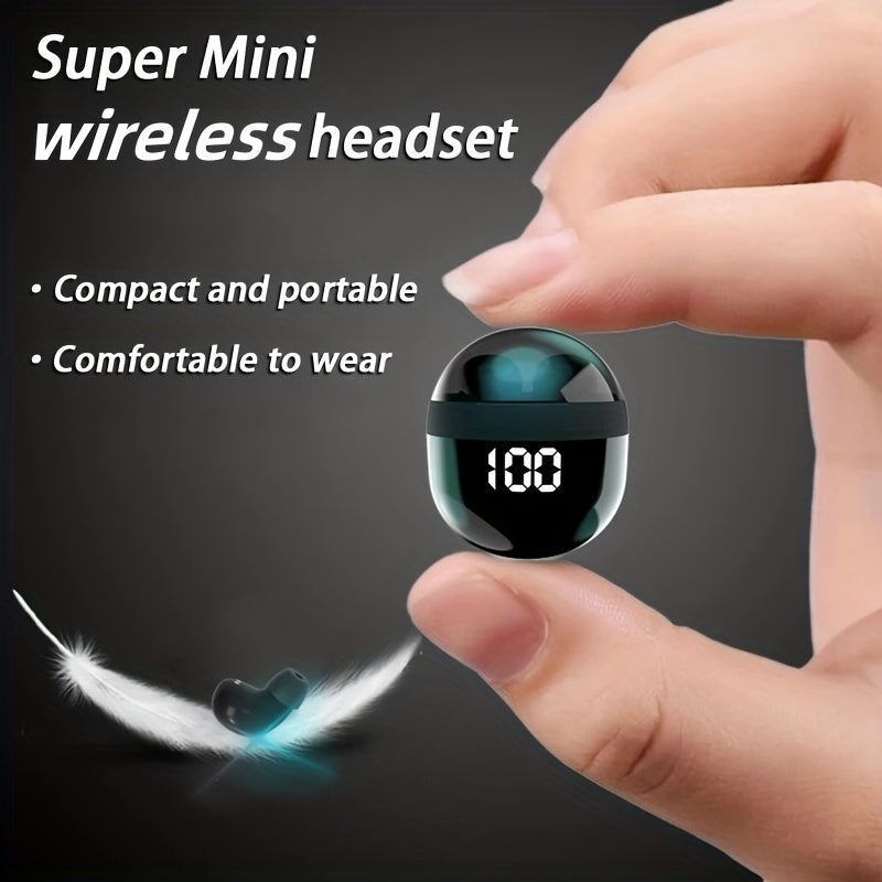 HighPeak Mini Wireless Earbuds in black held between fingers showing compact, portable design with digital battery display