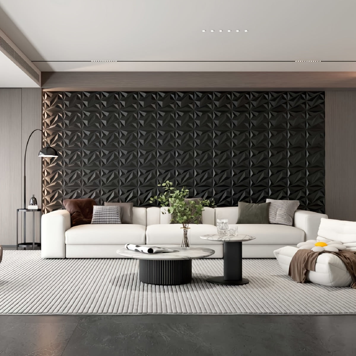 PrismWall™ – 3D Diamond Wall Panels in black installed in a modern living room with white sofa and minimalist decor by HighPeak