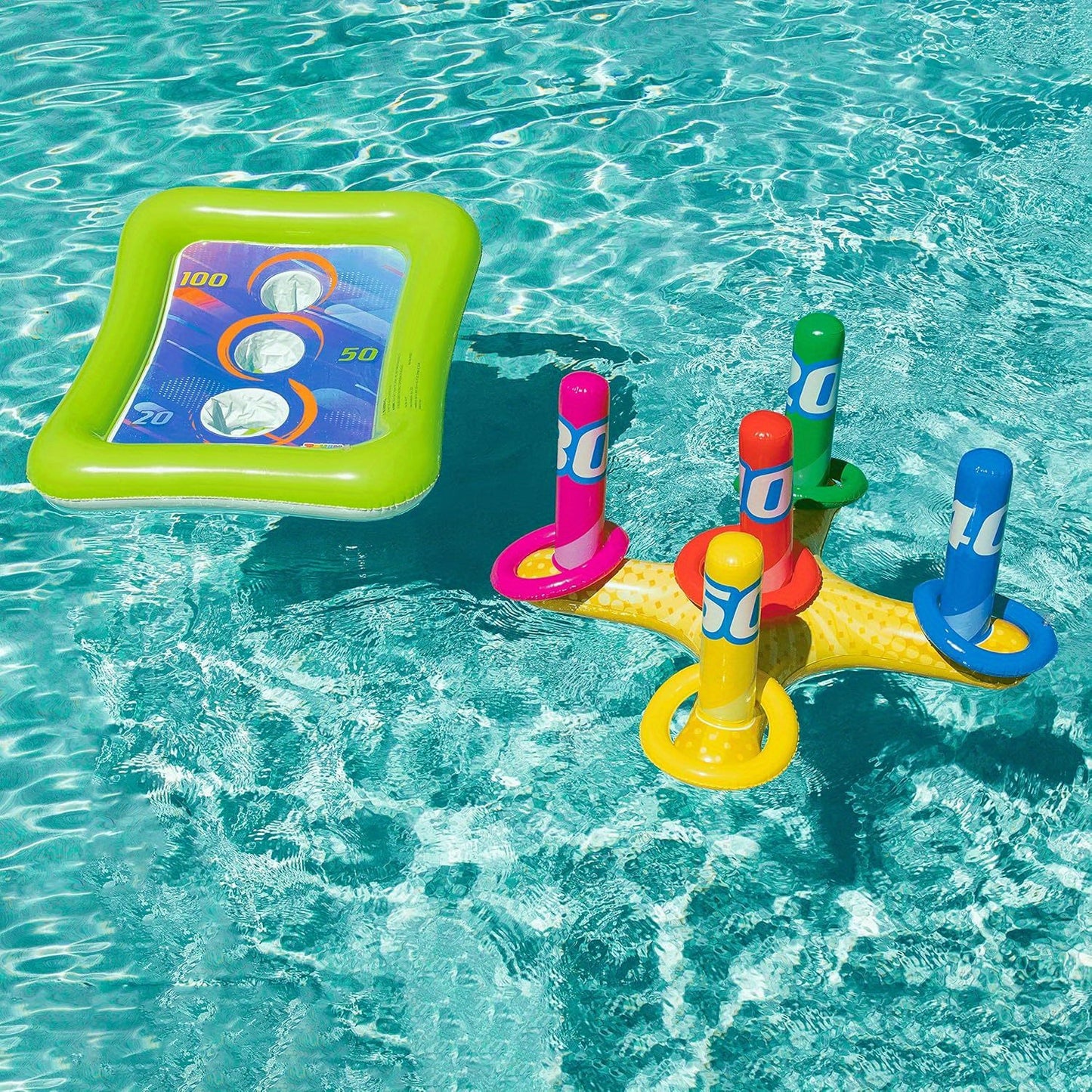 HighPeak 2-in-1 Inflatable Pool Toss Game in bright colors floating in pool with ring toss and corn-toss targets