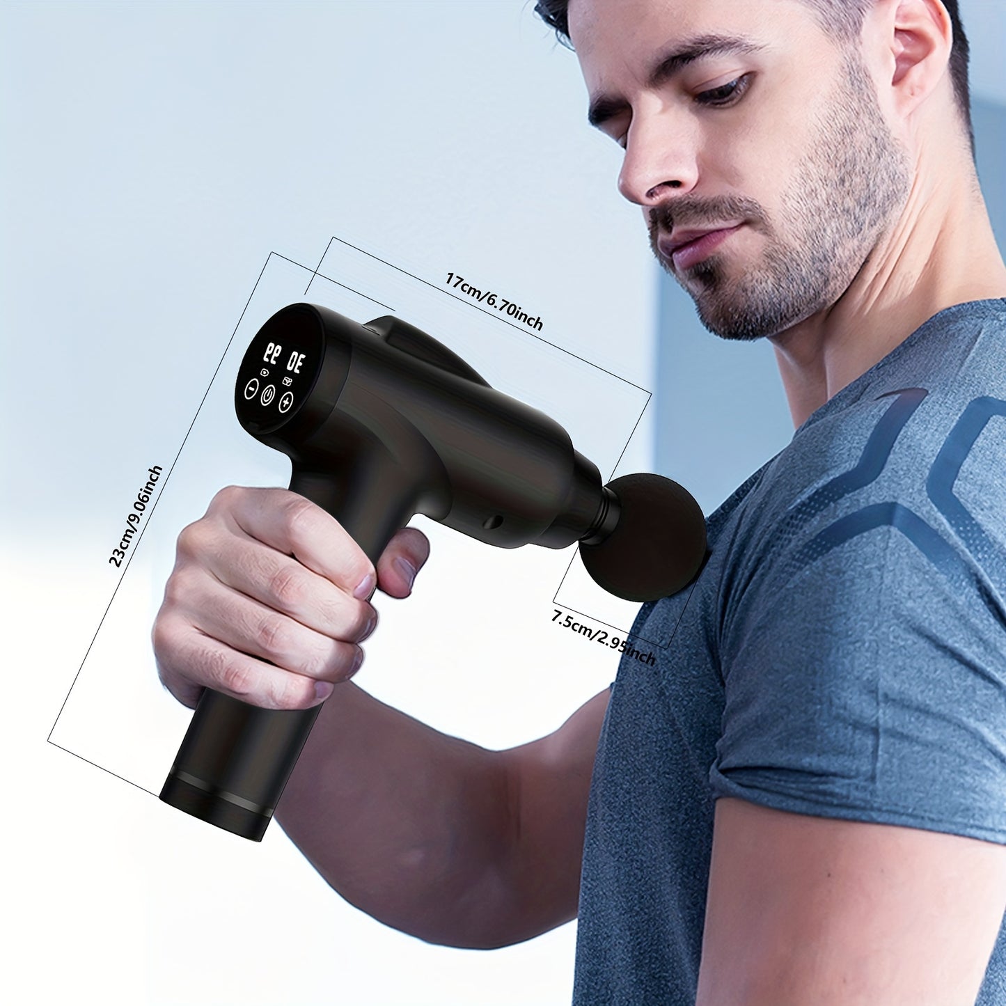 PulsePro™ deep tissue massage gun in black held by man using round attachment on shoulder with LED display visible