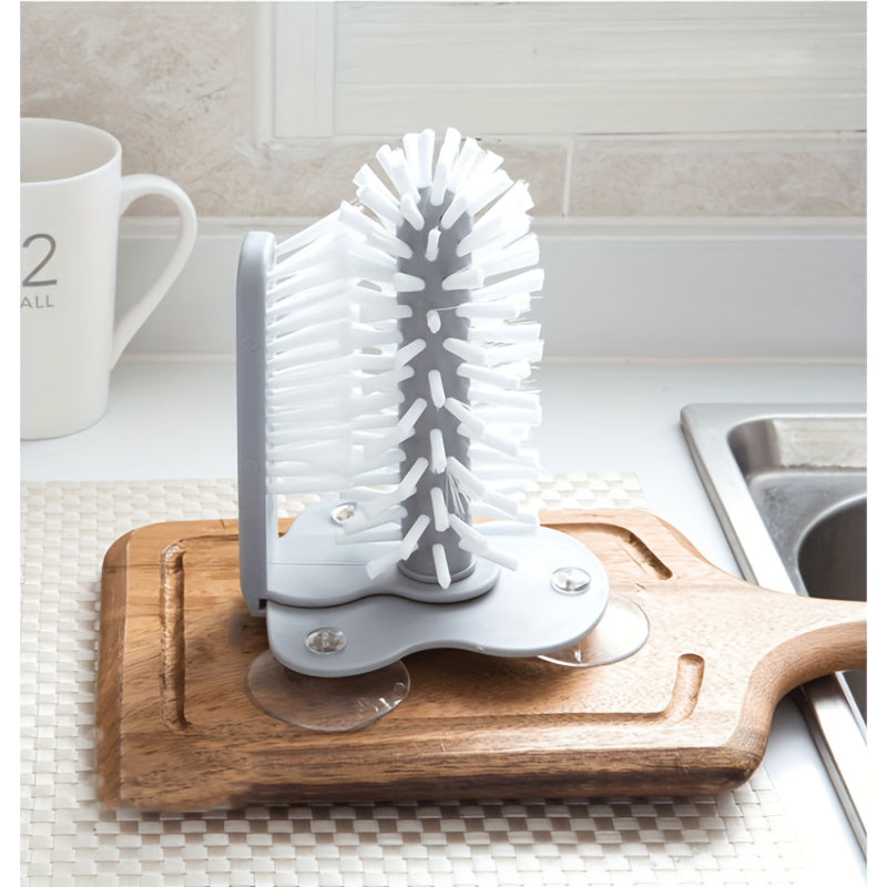 TwistClean™ - Cup & Glass Scrubber with white bristles mounted on wood board near sink, HighPeak cleaning tool