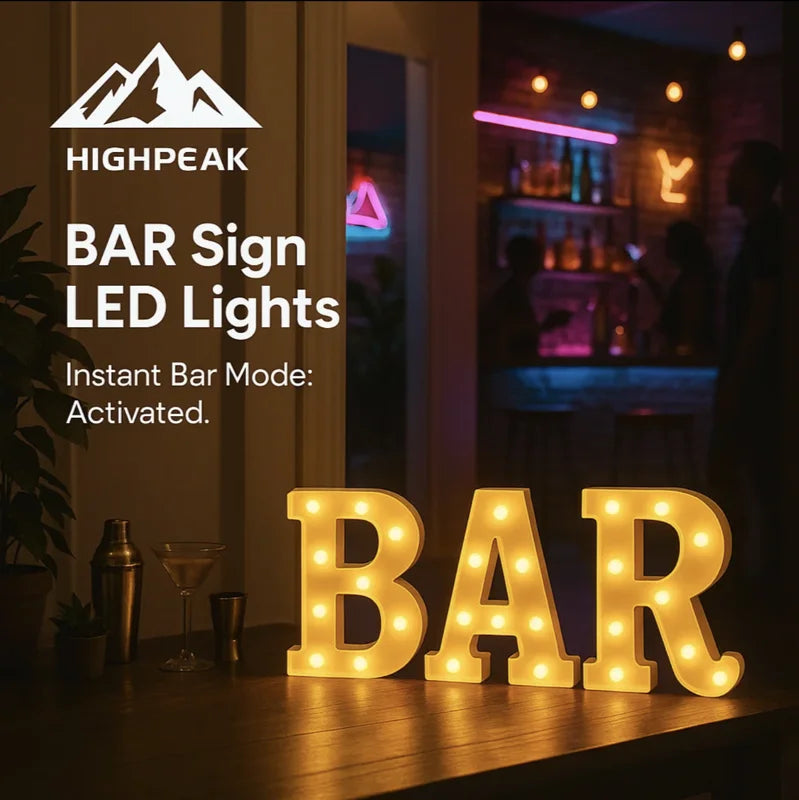 HighPeak BAR Sign LED Lights glowing warm white on a wooden bar counter in a cozy home bar setting