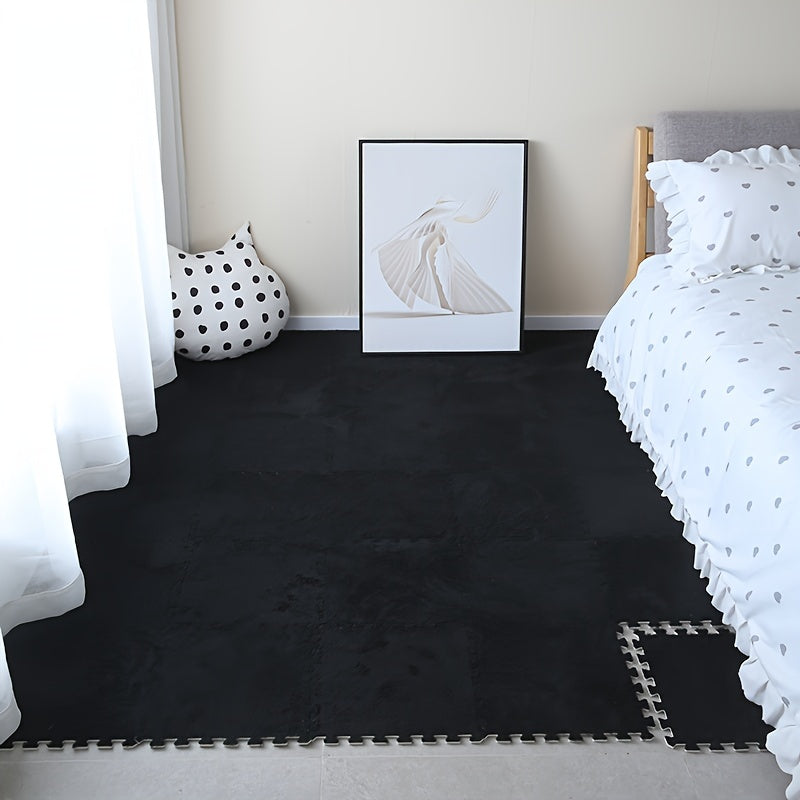 HighPeak CozyTiles™ 24pc Mat Set in black plush interlocking tiles in a bright bedroom with white bedding and decor.