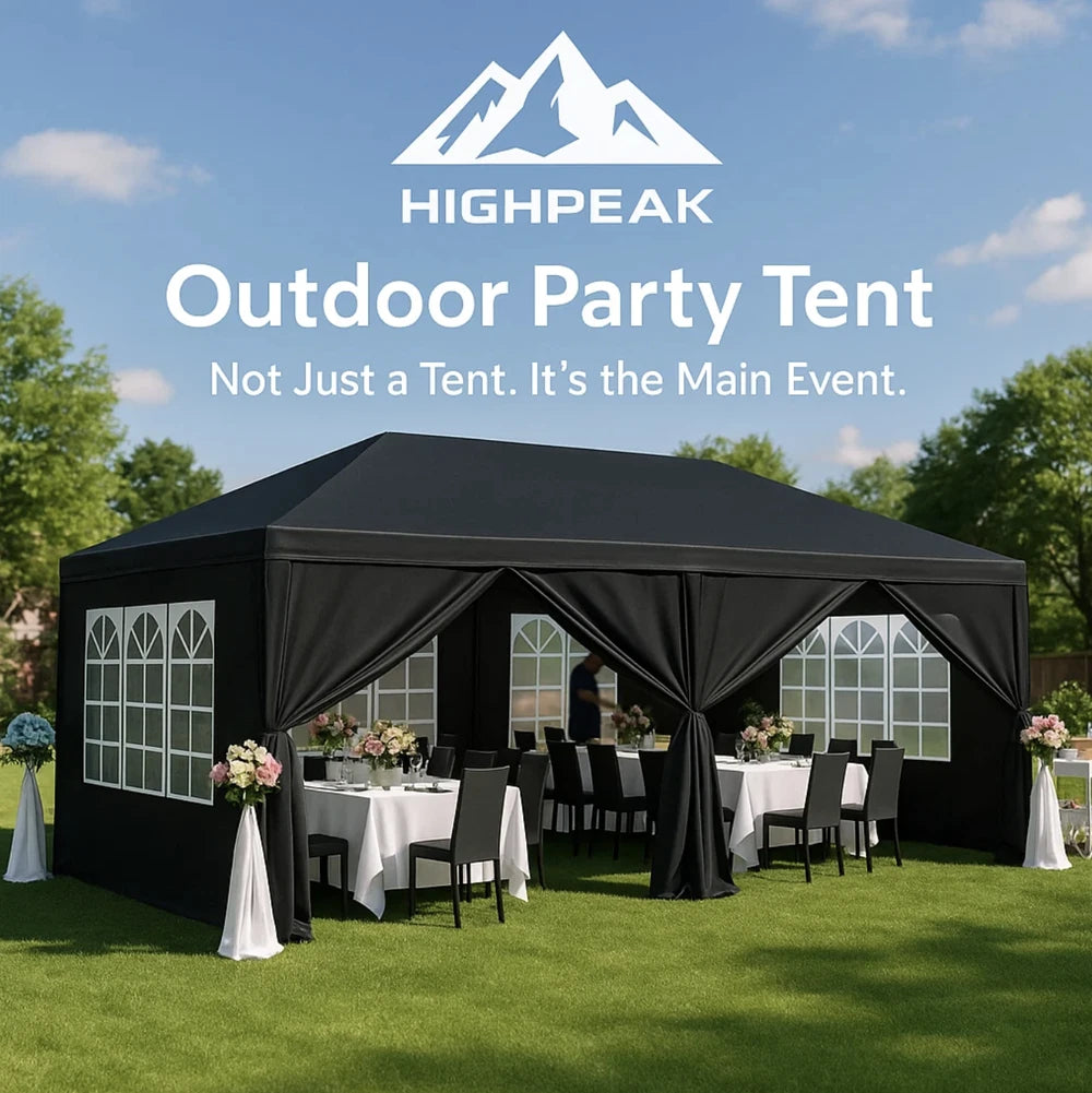 HighPeak Outdoor Party Tent in black with arched windows and removable sidewalls set up for an elegant outdoor event