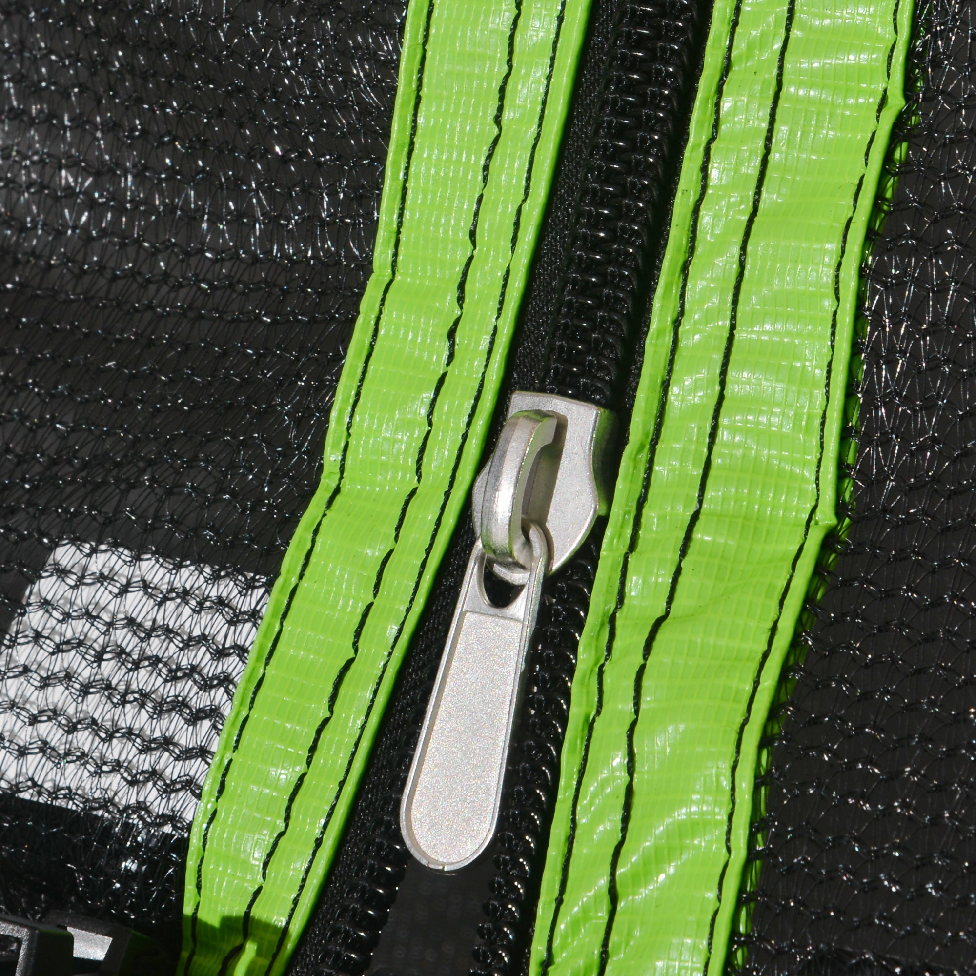 HighPeak Trampoline with Playground close-up of green-edged safety net zipper showing durable design and secure enclosure.