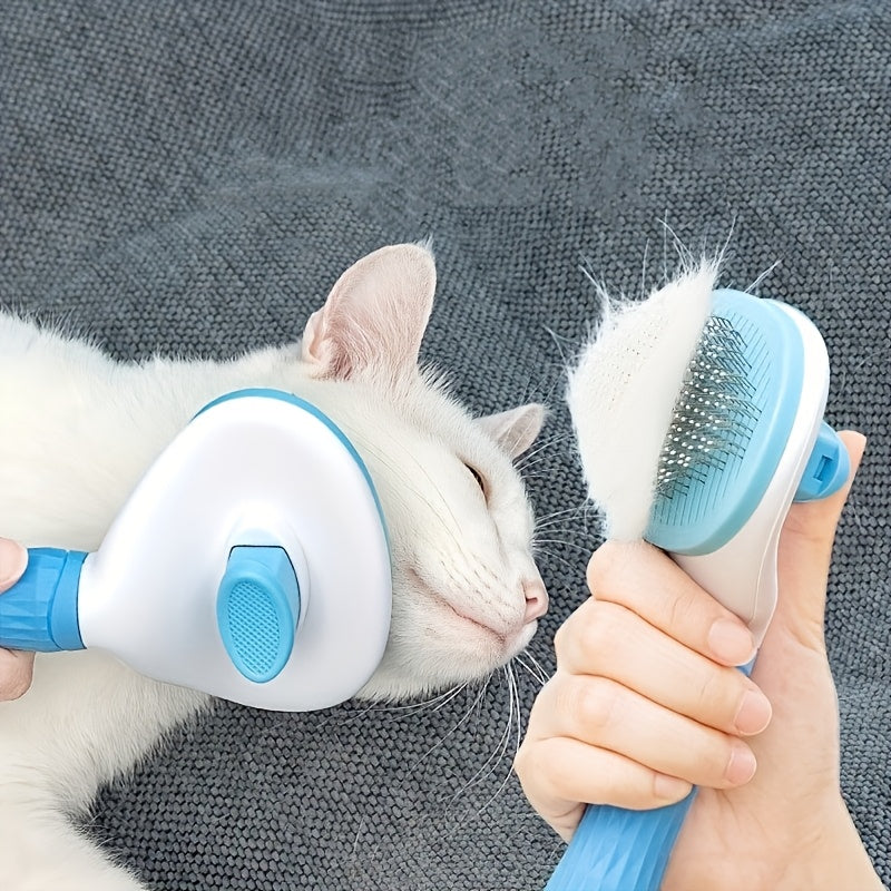 FurPop™ Self Cleaning Pet Brush in blue grooming a white cat with hair release button pressed on gray fabric background