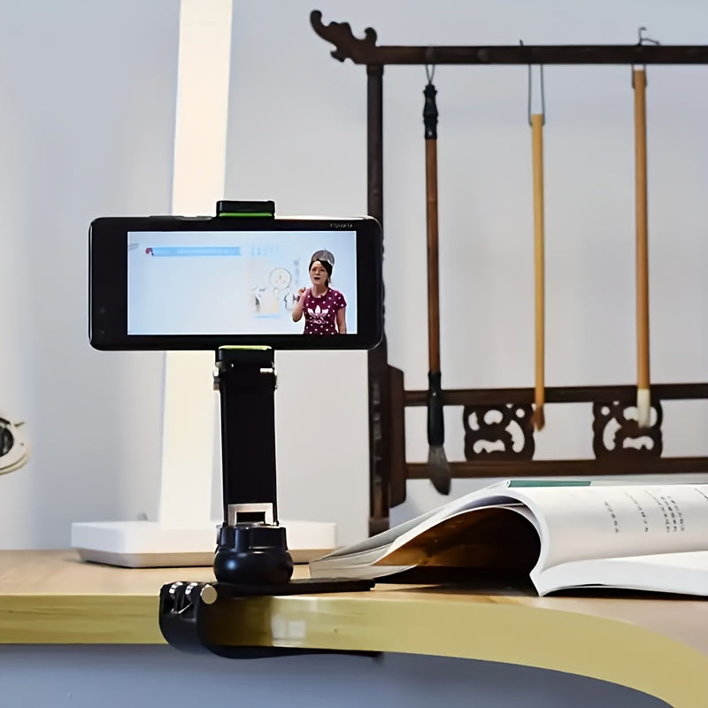HighPeak FlexiGrip™ - Rotating Phone Mount clamped to desk edge holding a phone in landscape for hands-free viewing