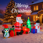 10.2FT Santa Christmas Train Inflatable glowing in a snowy front yard with the complete holiday character scene