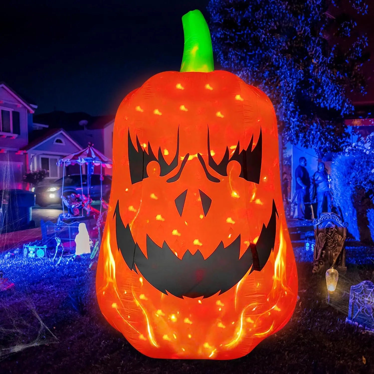 12FT Inflatable Jack-O’-Lantern illuminated beside a decorated Halloween home at night