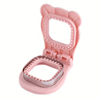SnackSeal™ DIY Sandwich Cutter in pink with stainless steel edge open on white background for crust-free pockets
