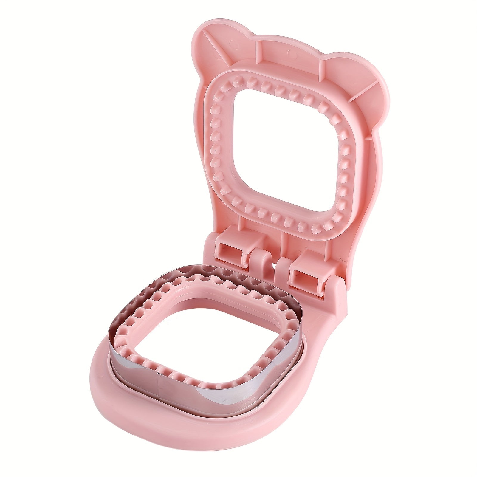 SnackSeal™ DIY Sandwich Cutter in pink with stainless steel edge open on white background for crust-free pockets