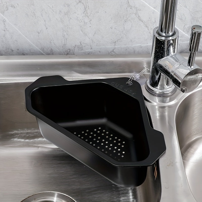 SinkMate™ Corner Strainer Basket in black, fitting snugly in a stainless steel sink corner, draining food scraps efficiently.