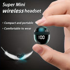 HighPeak Mini Wireless Earbuds in black held between fingers showing compact, portable design with digital battery display
