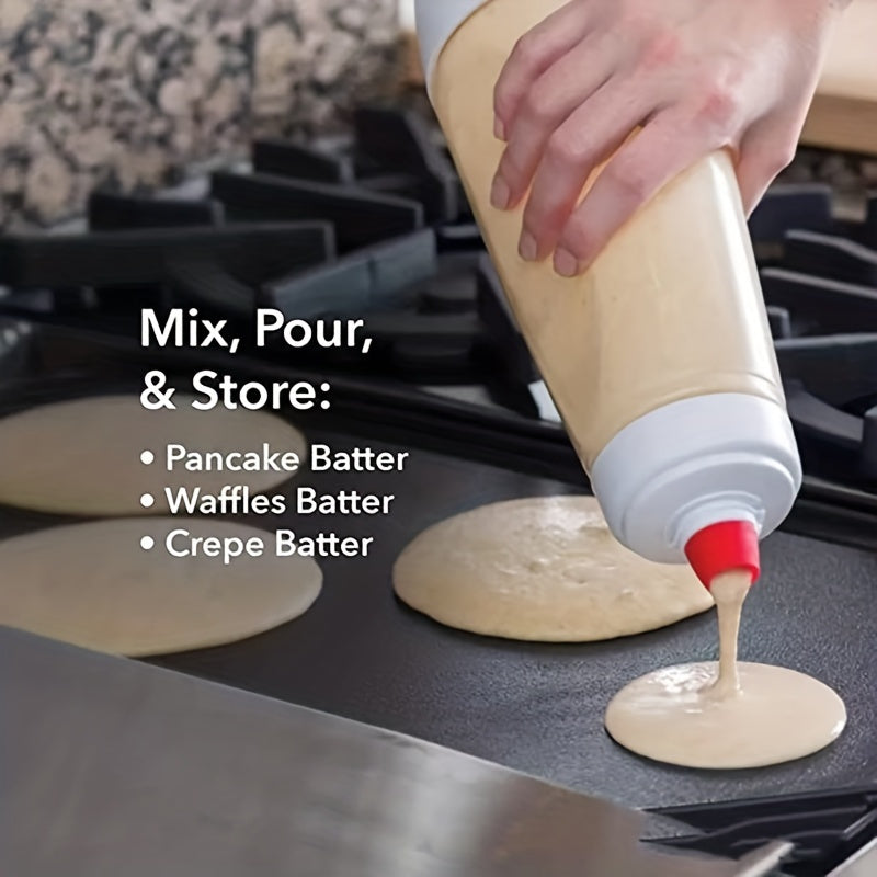 HighPeak FlipFlow™ - Batter Dispenser pouring pancake batter through red spout onto griddle in kitchen setting