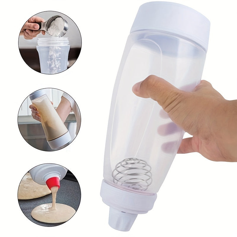 FlipFlow™ - Batter Dispenser shown in hand with built-in whisk ball, precision spout, and easy one-hand squeeze design by HighPeak