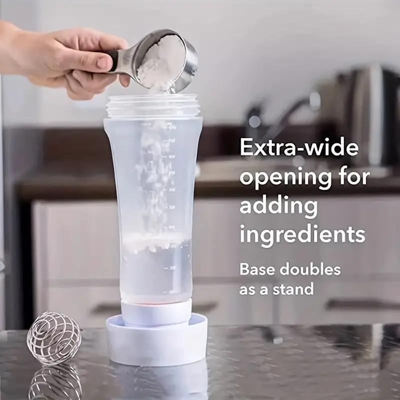 FlipFlow™ Batter Dispenser in clear with extra-wide opening, whisk ball, and base stand for easy ingredient adding by HighPeak