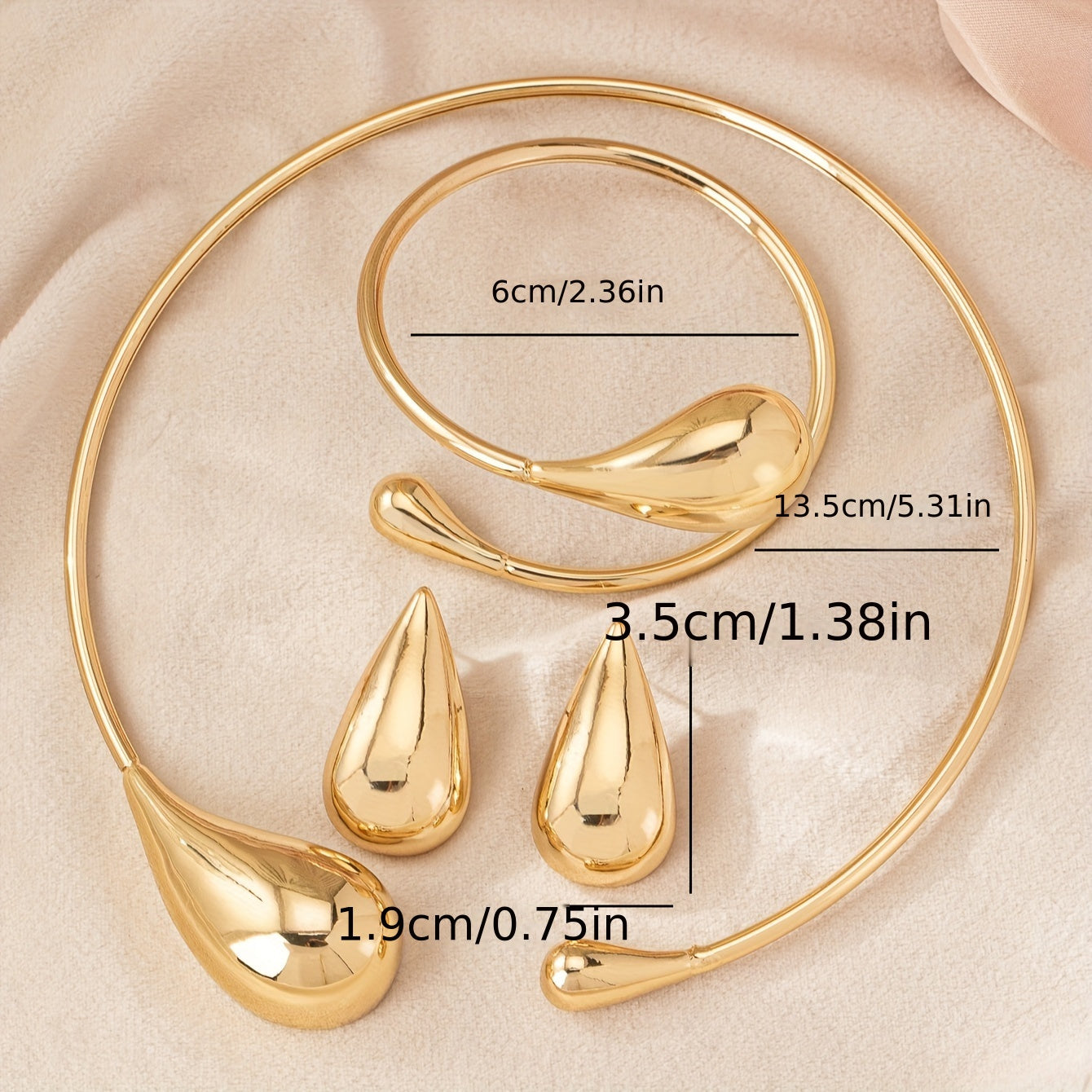 HighPeak Teardrop Jewelry Set in gold with necklace, bracelet, and earrings showcasing sculpted teardrop shapes.
