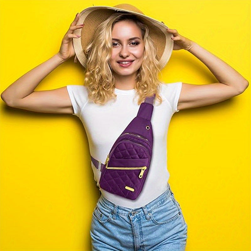 HighPeak Crossbody Bag in purple with quilted design and dual-zip pockets worn crossbody on smiling woman