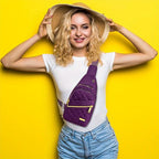 HighPeak Crossbody Bag in purple with quilted design and dual-zip pockets worn crossbody on smiling woman