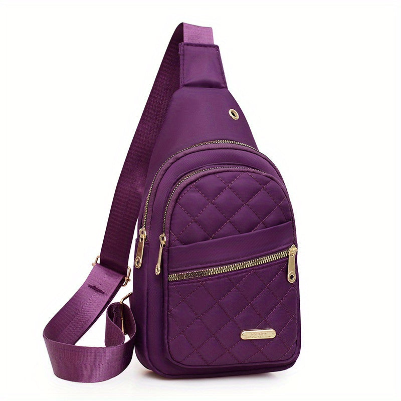 HighPeak Crossbody Bag in purple with quilted design, dual-zip pockets, and adjustable sling strap for hands-free comfort