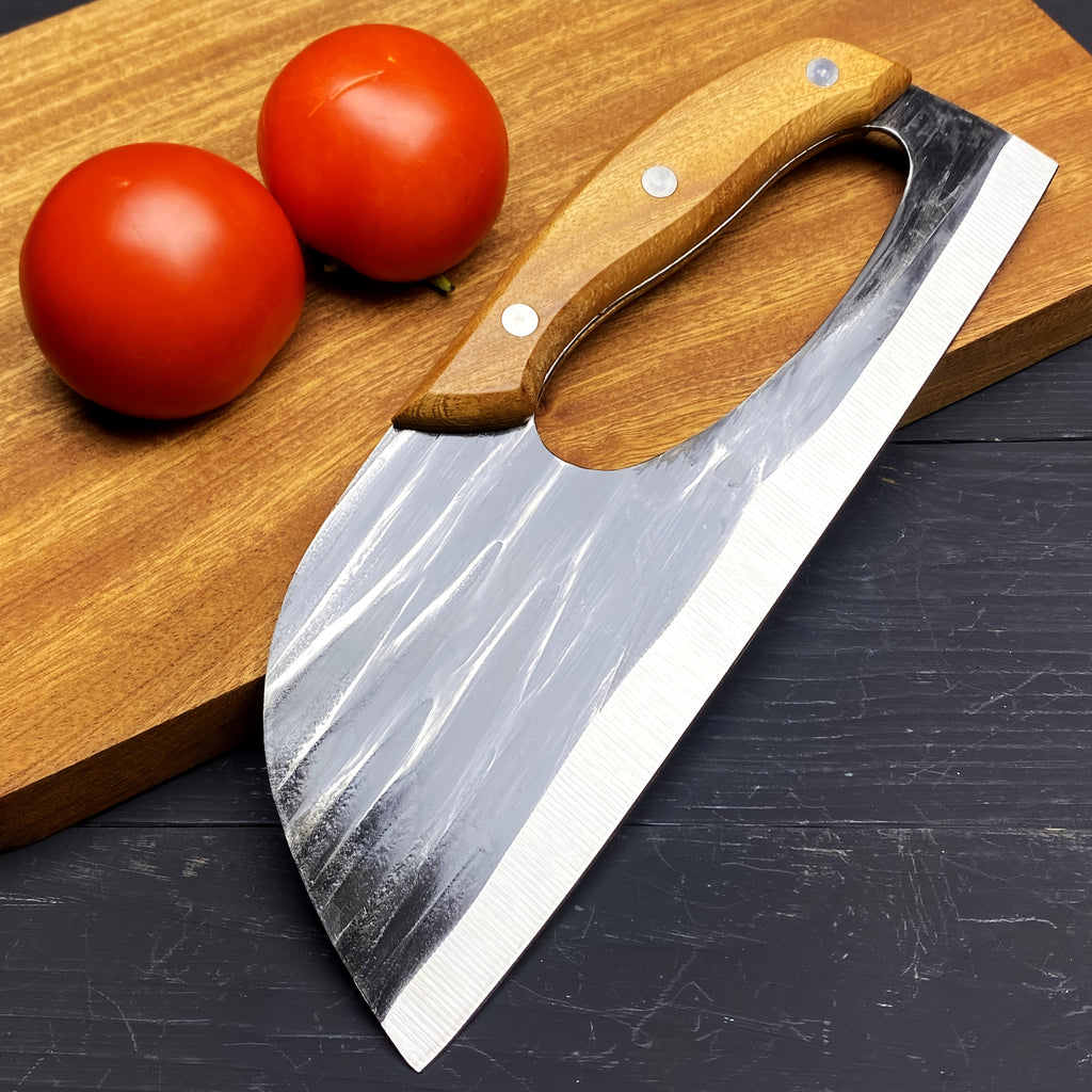 HighPeak Ergonomic Chef Knife with wooden handle on a cutting board next to fresh tomatoes for precise slicing.