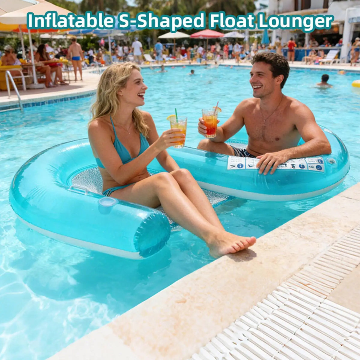 2-Person Pool Lounger beside a pool edge with a smiling couple and an inflatable S-shaped lounger heading