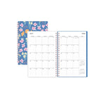 26/27 Weekly Monthly Planner showing the floral cover behind an open July 2026 monthly calendar spread.