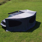270° Vehicle Awning Tent mounted beside a gray off-road vehicle with the enclosure deployed.
