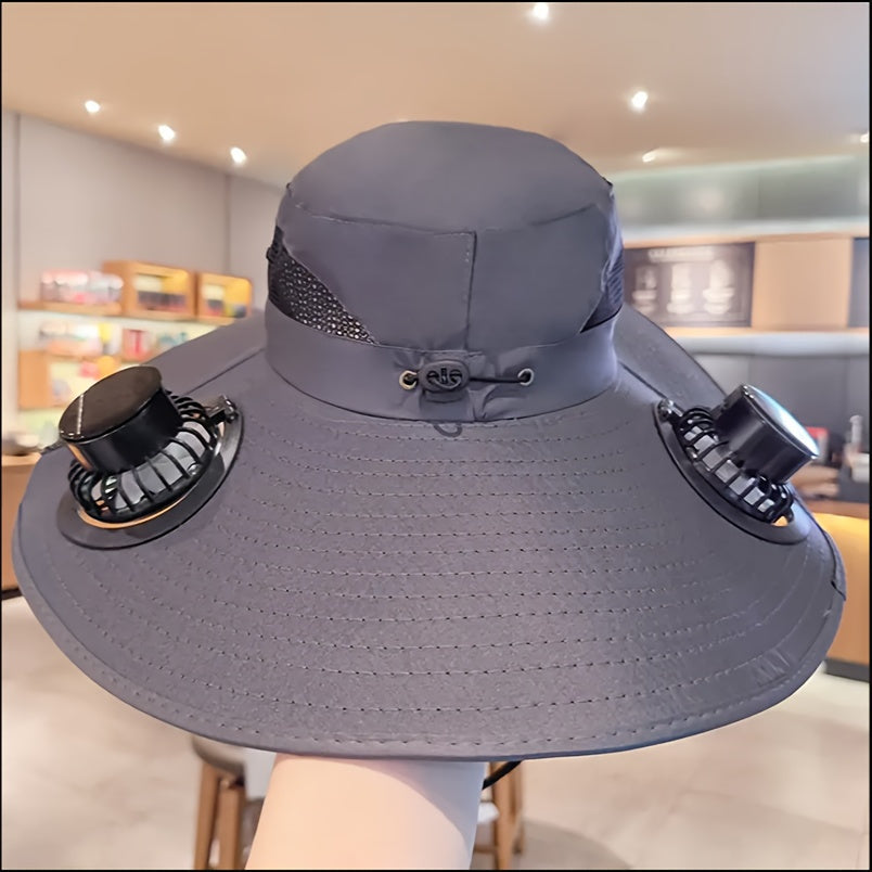 HighPeak Cooling Fan Sun Hat in gray with dual fans, breathable mesh, and adjustable fit shown indoors in a casual setting