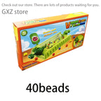 VeggieBlasters™ - Battle Arena family game box in bright orange with green playset and marble shooter by HighPeak