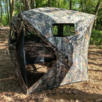 360° One-Way Camo Tent with its curved entry open and mesh-lined observation interior visible