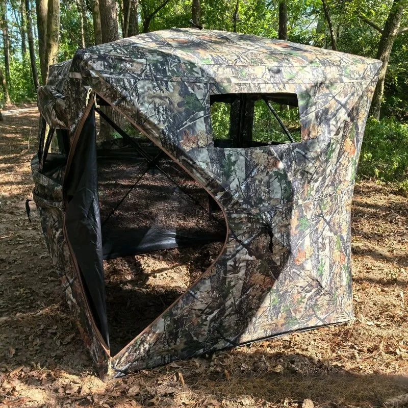 360° One-Way Camo Tent with its curved entry open and mesh-lined observation interior visible
