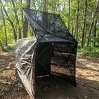360° One-Way Camo Tent partly opened to show its automatic pop-up frame and mesh structure