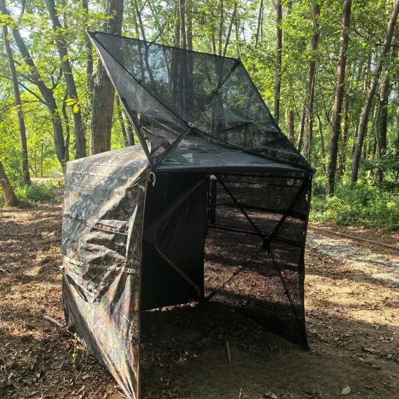 360° One-Way Camo Tent partly opened to show its automatic pop-up frame and mesh structure