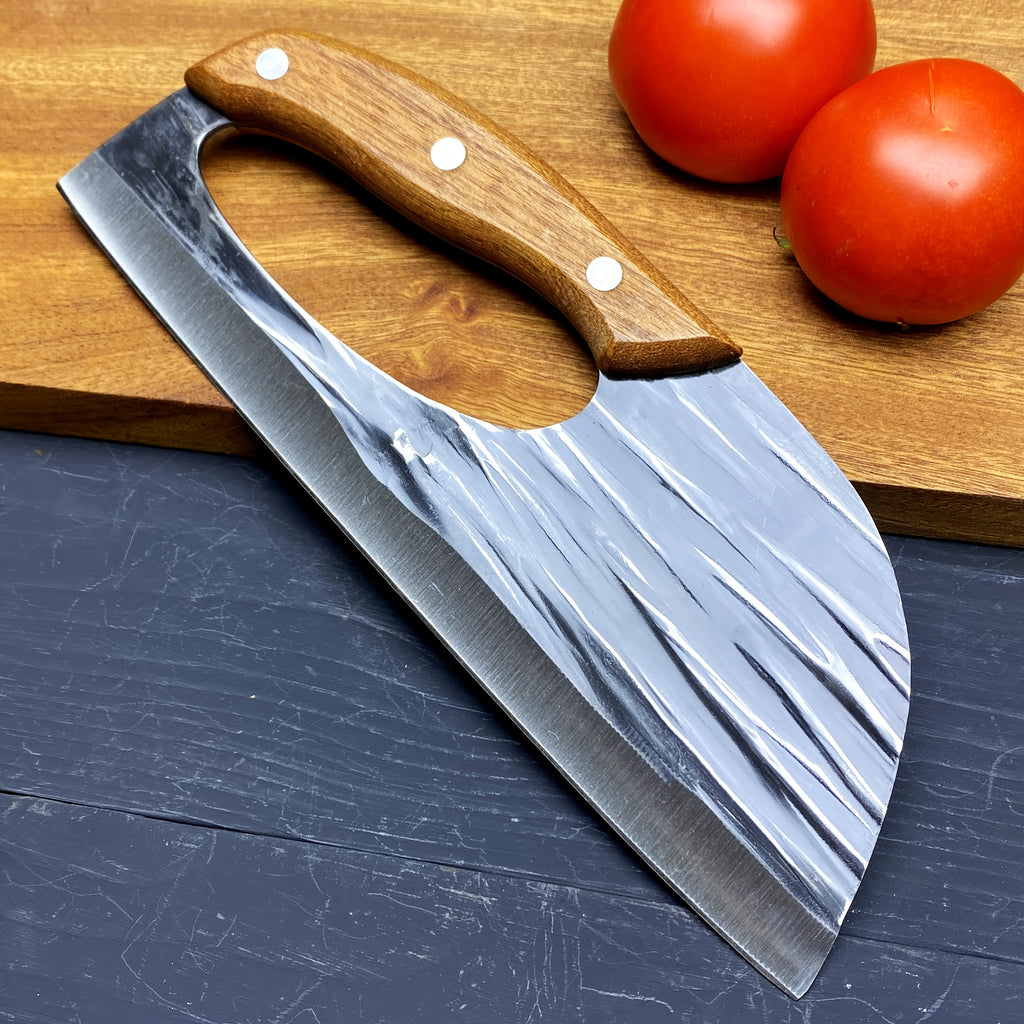 HighPeak Ergonomic Chef Knife with wooden handle and sharp handcrafted steel blade on cutting board with tomatoes