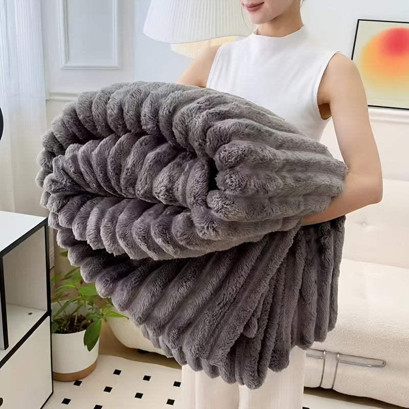 Plush gray Cozy Fuzzy Blanket with ribbed texture shown folded, displaying ultra-soft faux fur material and double-sided design