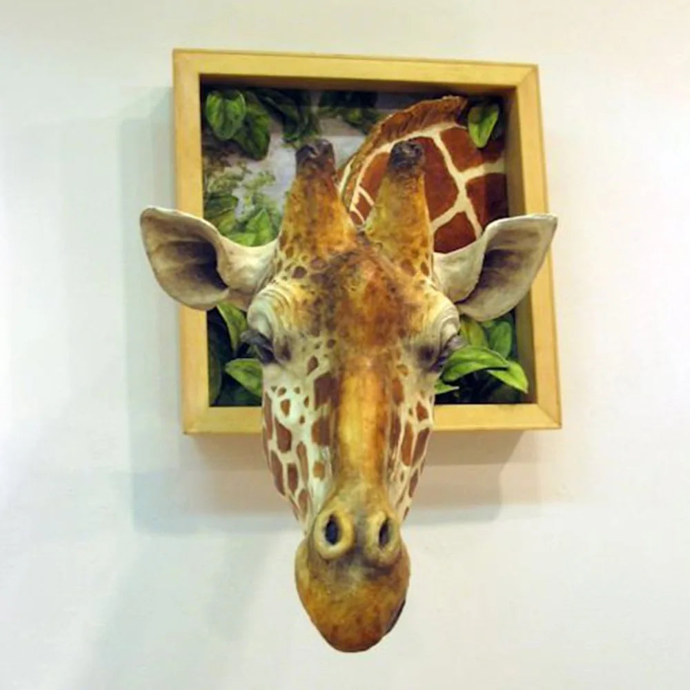 3D Giraffe Wall Sculpture front view showing its ears, horns, spotted face, and framed foliage.