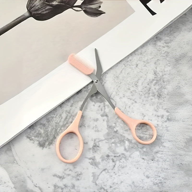 BrowCraft™ eyebrow trimming scissors with built-in comb and pink handles on marble surface by HighPeak