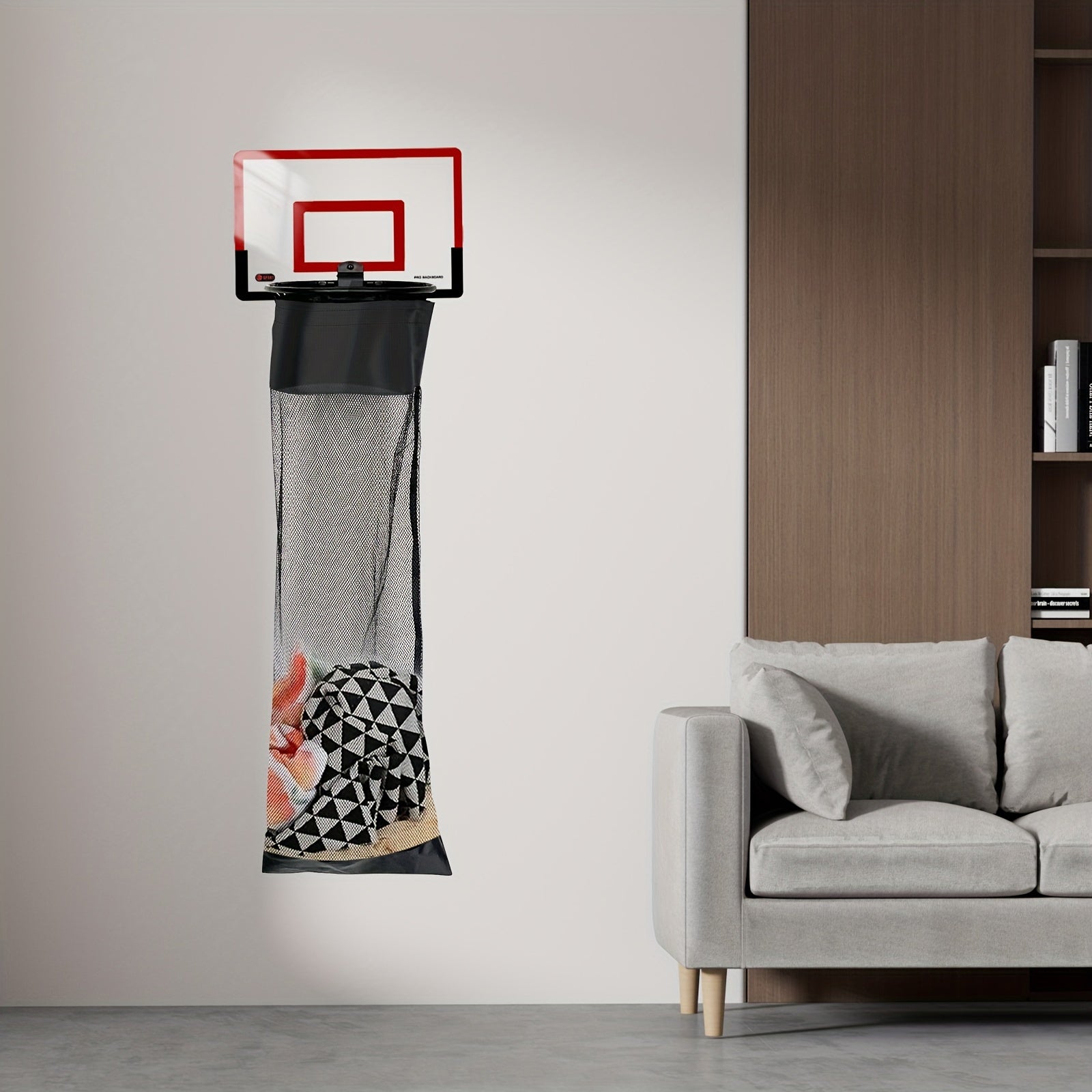 SwishBin Laundry Hoop in red and black over-the-door basketball design with built-in laundry net by HighPeak in modern living room setting
