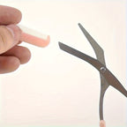BrowCraft™ – Eyebrow Trimming Scissors with built-in comb held by hand, stainless steel blades for precise brow shaping