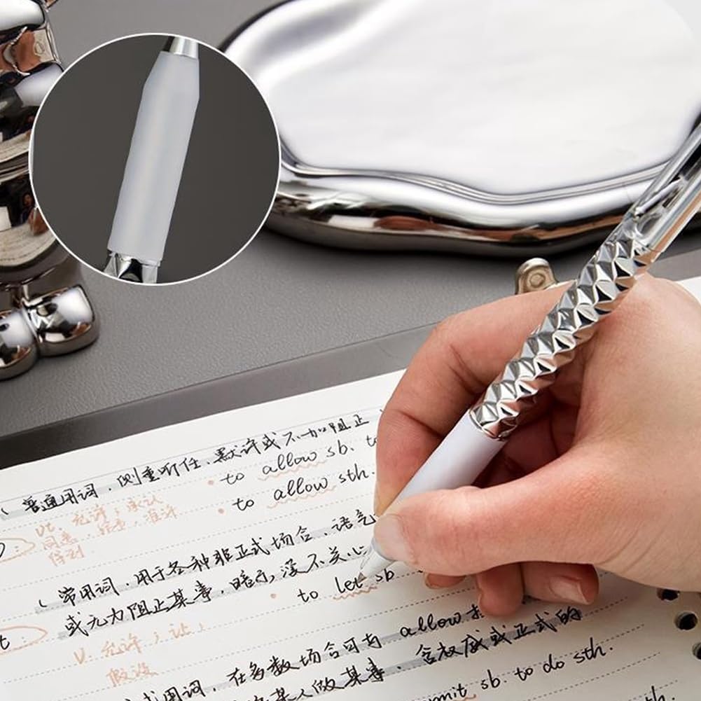 Geometric Metal Crinkle Pen with textured silver body shown writing on paper, featuring unique crinkled design pattern