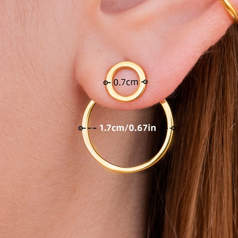 HighPeak Geometric Gold Earrings shown as two gold-plated circular studs on ear, minimalist and bold style.