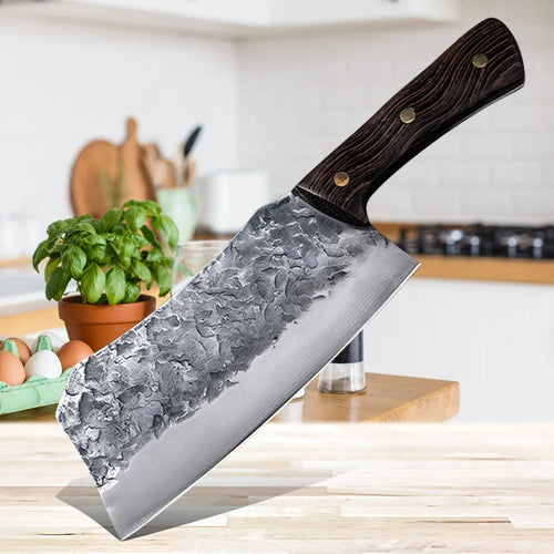 7-Inch Cleaver Chef Knife with a hammered blade and three-rivet wooden handle on a kitchen counter.