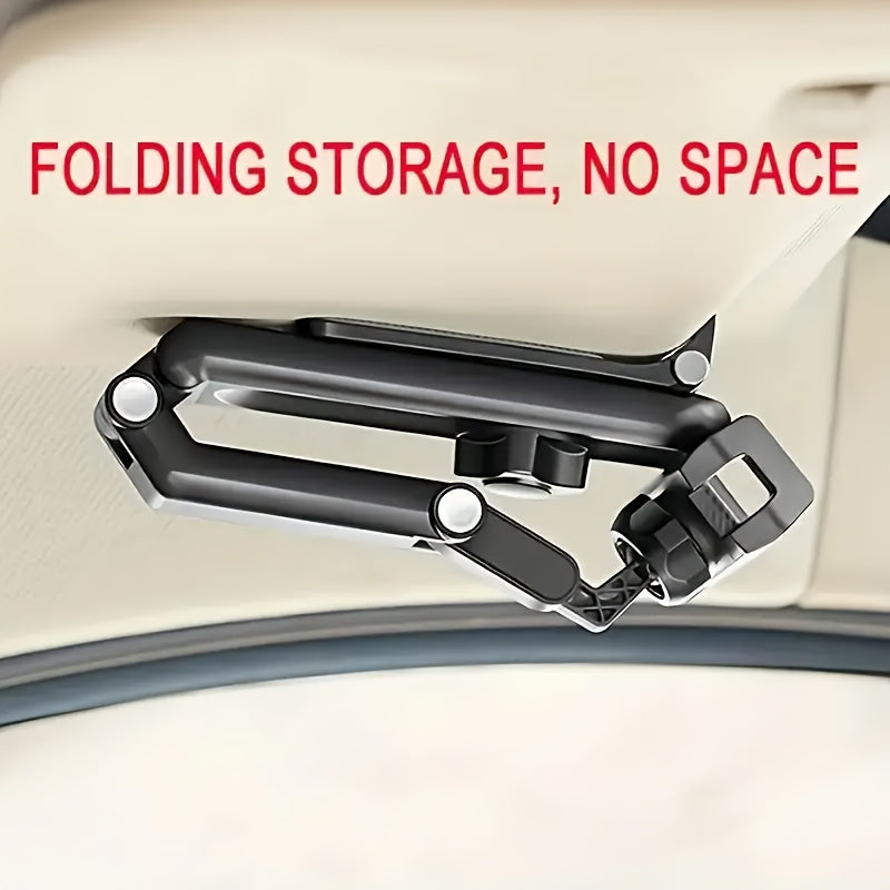 FlexiGrip™ rotating phone mount folded flat on a car visor in black, showcasing compact storage by HighPeak.