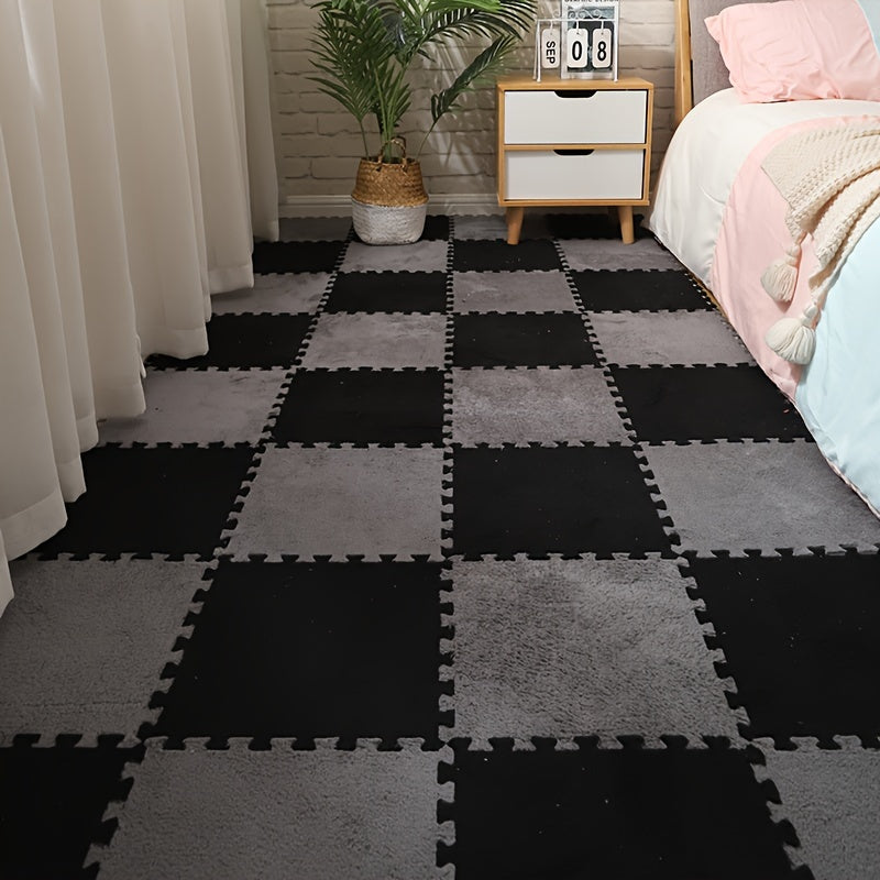 CozyTiles™ - 24pc Mat Set in black and gray plush tiles arranged in a bedroom setting with soft curtains and bedside table.