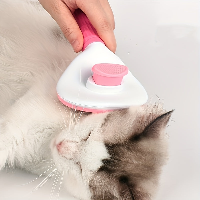 FurPop™ self cleaning pet brush in white and pink grooming a relaxed long-haired cat with one-click hair removal