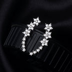 HighPeak Ear Climber Earrings with sparkling rhinestones on black background showcasing elegant curved design