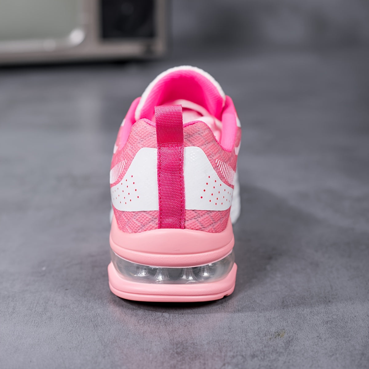 Air-Cushion Gradient Sneakers in pink and white with mesh design, showing rear view with air cushion sole detail