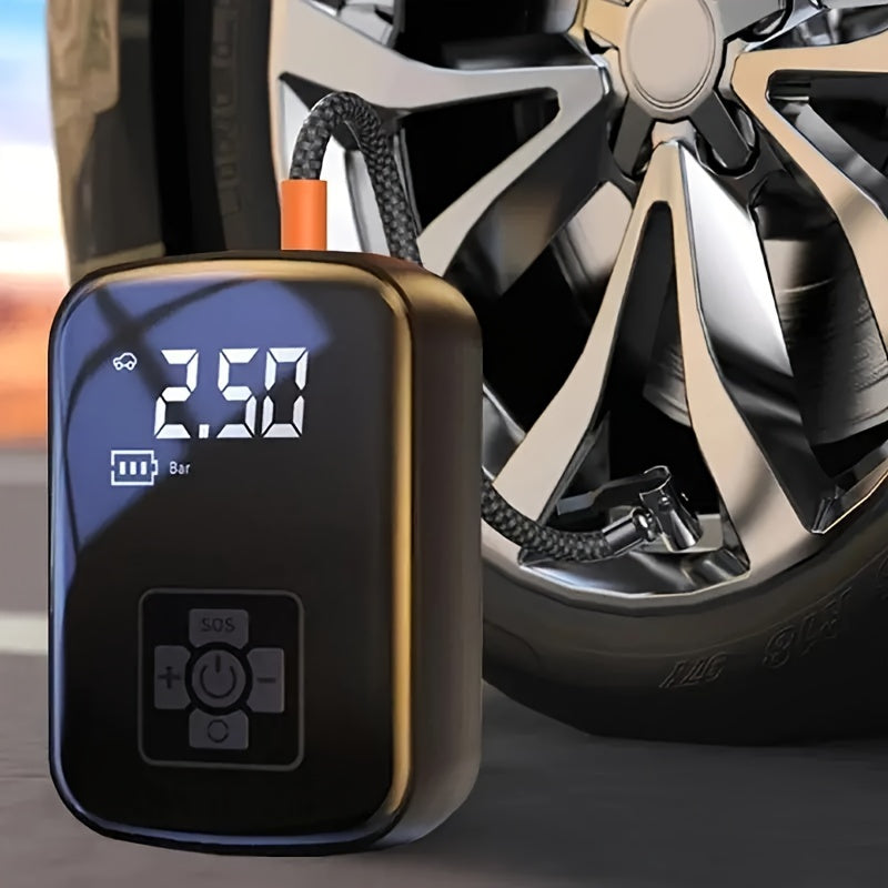 AirBolt Mini smart tire inflator with digital display connected to car wheel - compact black and gold design with LED screen